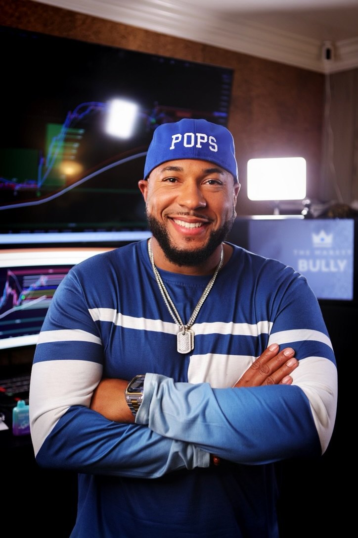 Richard Hall Jr. smiling in his trading studio